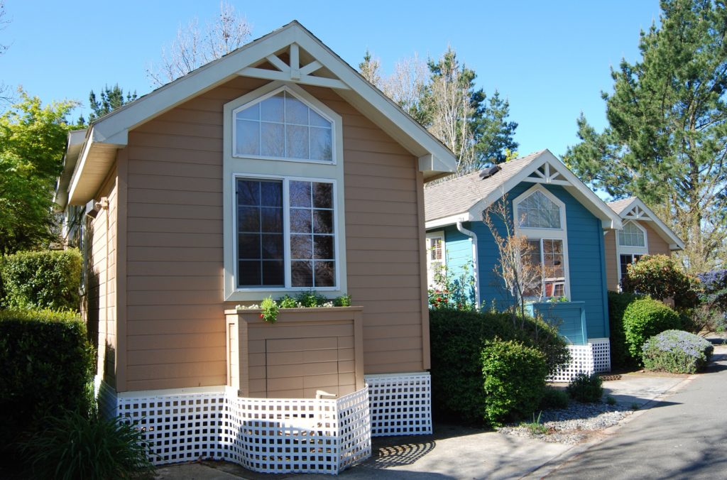 Three very small houses next to each other. Small eco-footprint.