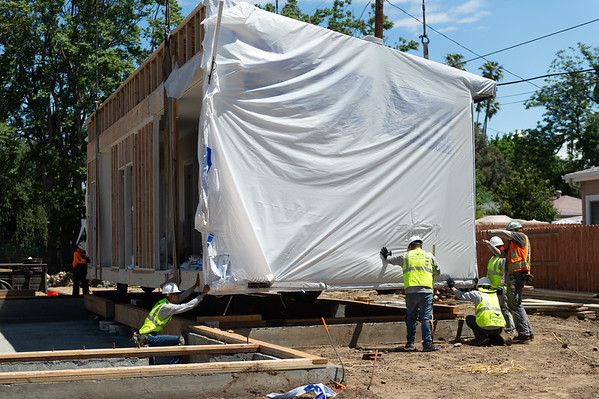 Crews Install Prefab Homes in Less Than a Day